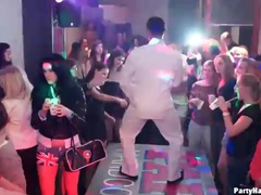 Girls fool around with the dancing guys at club