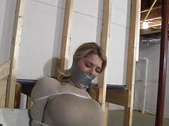 Chesty blonde restrained with zip ties & gagged