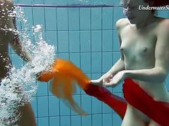 Two redheads swimming super hot!!!