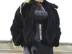 Blonde in latex catsuit & fur tubes