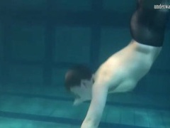 Sporty girl in black pantyhose swims erotically videos