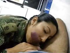 Military woman sucking soldier