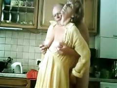 Se mum and dad having fun in the kitchen. stolen video