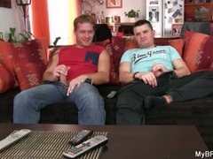 Guys sucking dick and stroking cock on couch