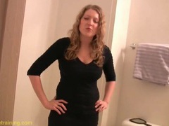 Curvy girl strips and pees in a bowl