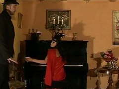 Vintage girl caned on the piano clip