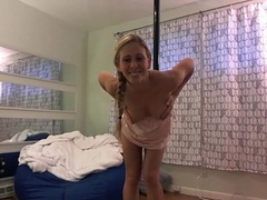 Dancing blonde chick bares her tits on webcam