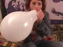 Balloon fetish- girl pops a balloon with her tongue