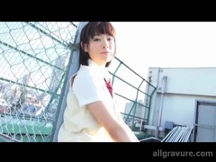 Cute japanese schoolgirl in sleeveless cardigan