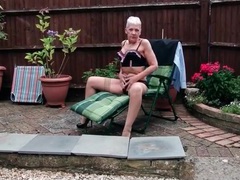 Granny models her hot lingerie set outdoors