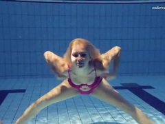 Bikini girl wants to swim naked in the pool