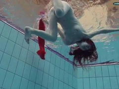 Milky white teen beauty goes for a nude swim movies at kilopills.com