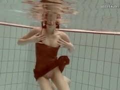 Her skinny body looks sexy swimming underwater videos