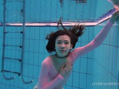Leggy girl goes swimming in her leotard videos