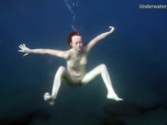Redheaded girl is so sexy naked in the water videos