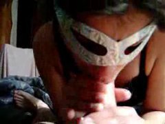 Masked amateur sucks cock in homemade video