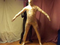 Man is wrapped in plastic entirely videos