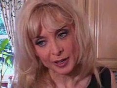 Milf puts on a strapon and fucks teen clip