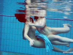 Girls in elegant dresses swimming underwater videos