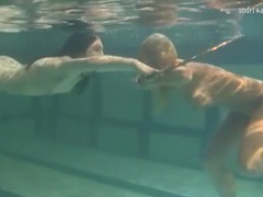 VidsPlus presents: Underwater girls play with a hula hoop