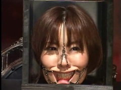 TubeChubby presents: Japanese head in a box in kinky bdsm video