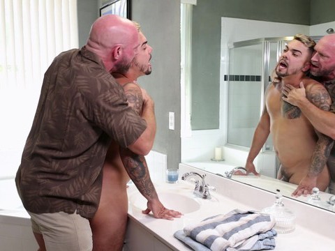 MomsCult presents: Tattooed gay dude enjoys while getting fucked from behind