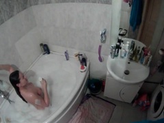 Lingerie Mania presents: Amateur brunette in bathtub voyeur video