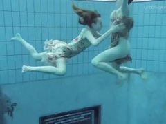 AlphaErotic presents: Teens jump in the pool in their cute dresses