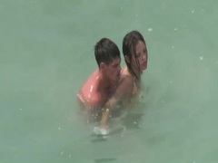 sGirls presents: Naked couples caught fucking in the ocean