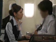 Japanese stewardess giving a handjob