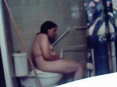 AlphaTeenies presents: Chubby chick uses shower head to masturbate