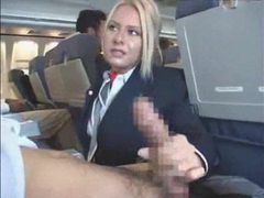 NymphoClips presents: Stewardess sucking cock on a plane