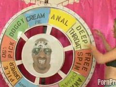 TubeWish presents: Two sluts in bikinis spin the big wheel