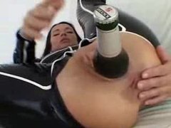 TubeWish presents: Bottle of beer inside the latex girl's ass