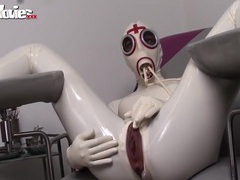 KiloVideos presents: Latex fetish ladies fucking a giant black dildo